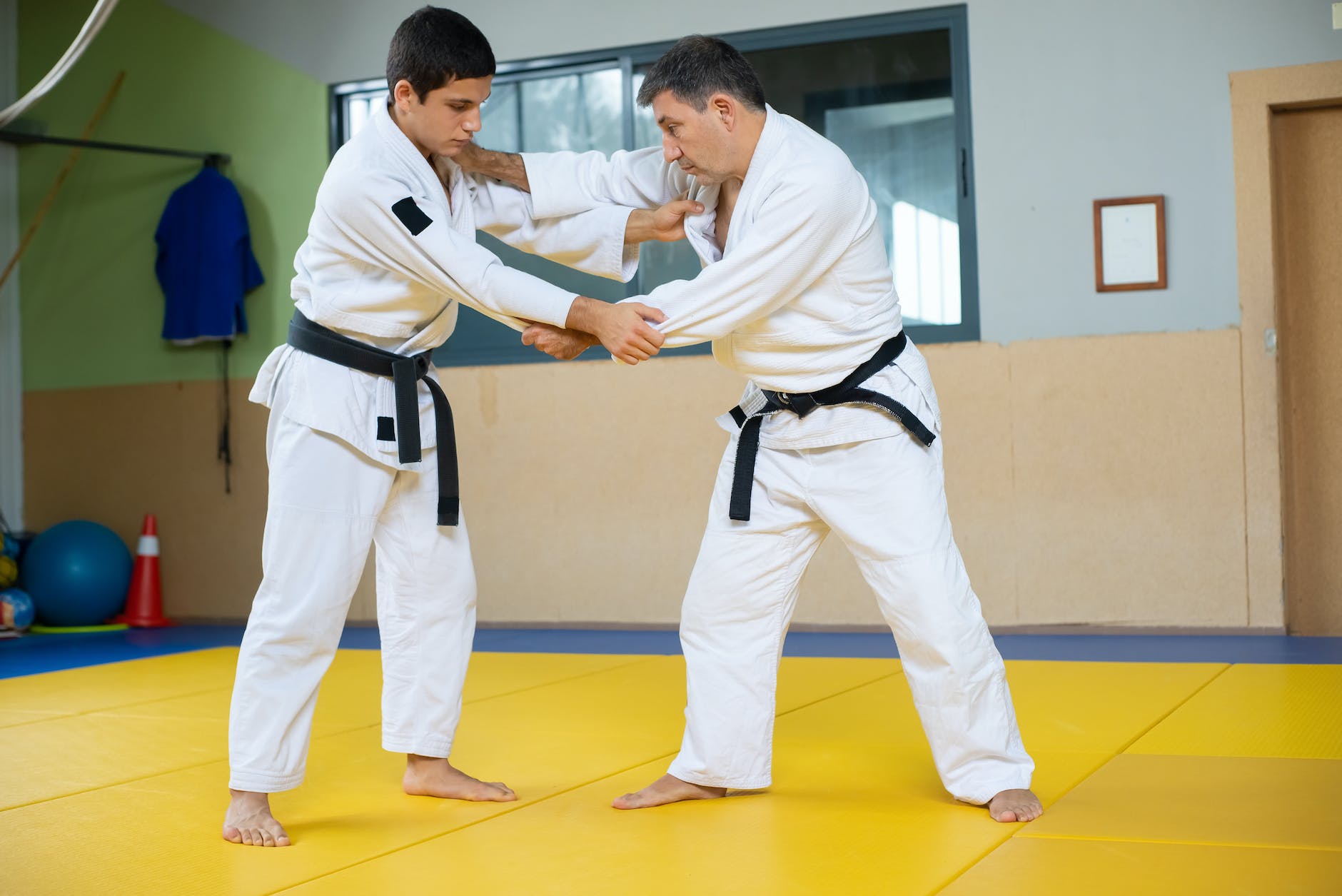 a men doing judo together