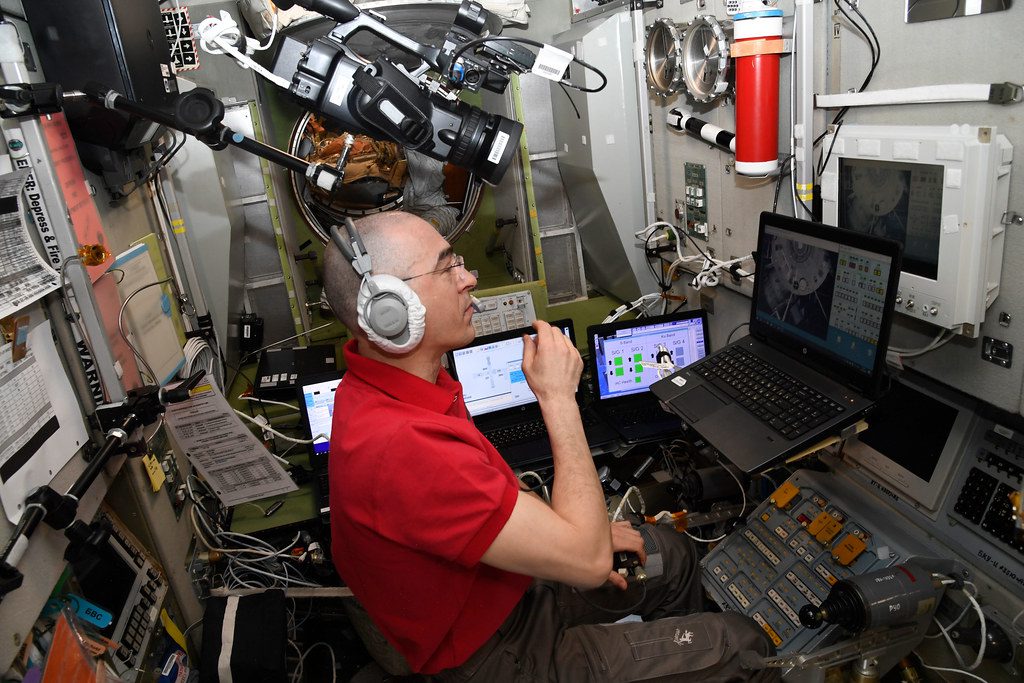 Cosmonaut Anatoly Ivanishin practices remote spacecraft maneuvering techniques