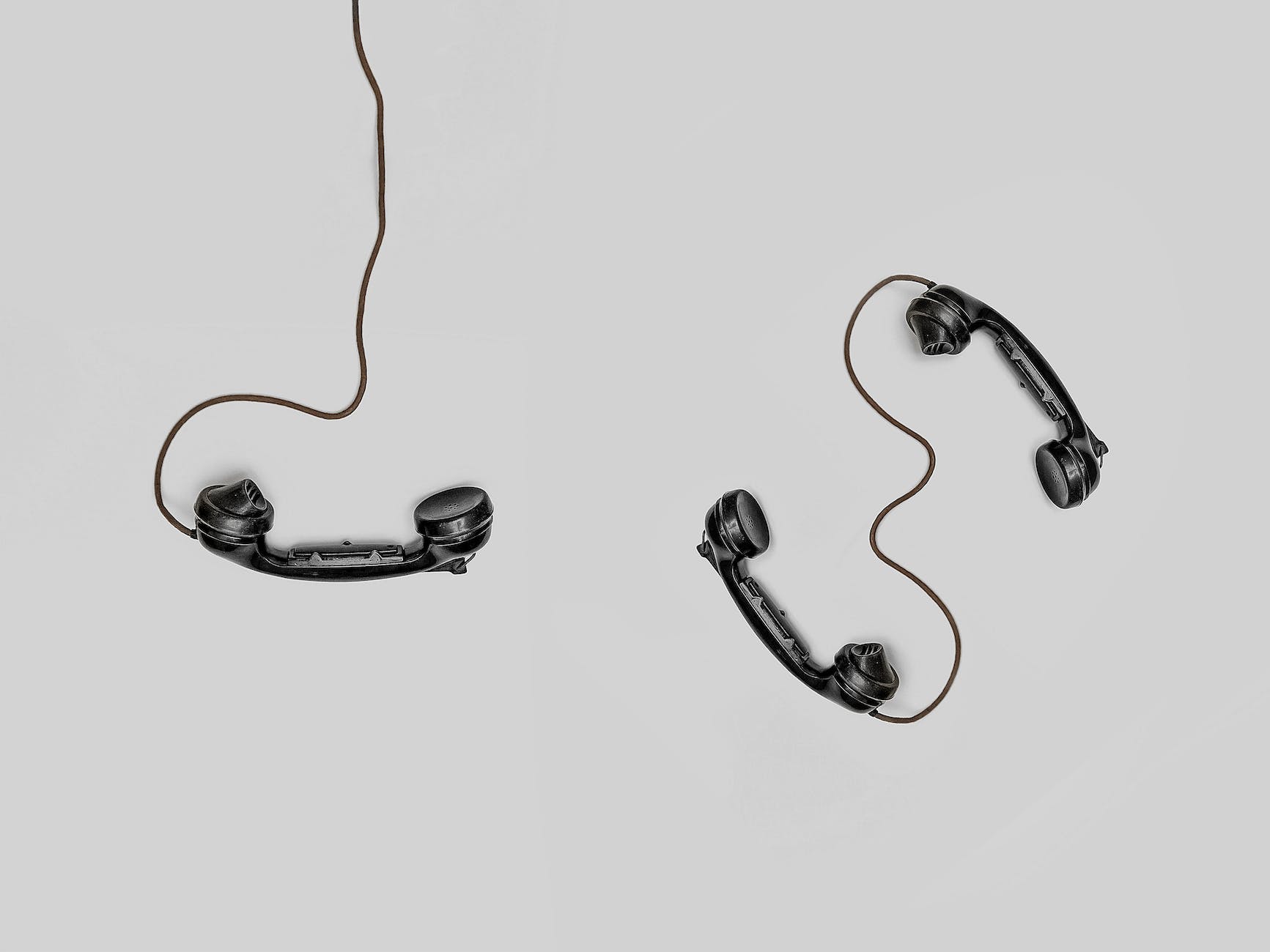 three black handset toys